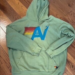 Aviator Nation Green Hoodie with Blue and Rainbow Accents